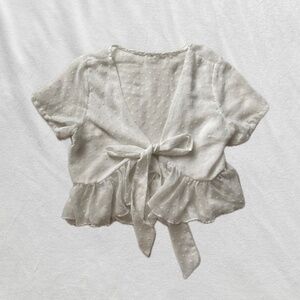 white sheer polka dot ruffle bow top